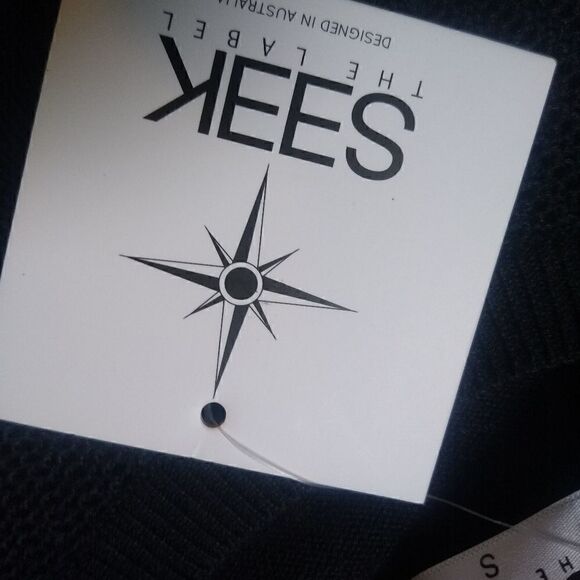 🆕 SEEK The Label Asymmetrical Ruffle Sleeve Boho Sweater Black Small - Picture 3 of 6